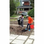 Placing Compost on the beds!